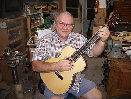 The legendary Randy Wood, putting the finishing touches on my
            1930s Martin